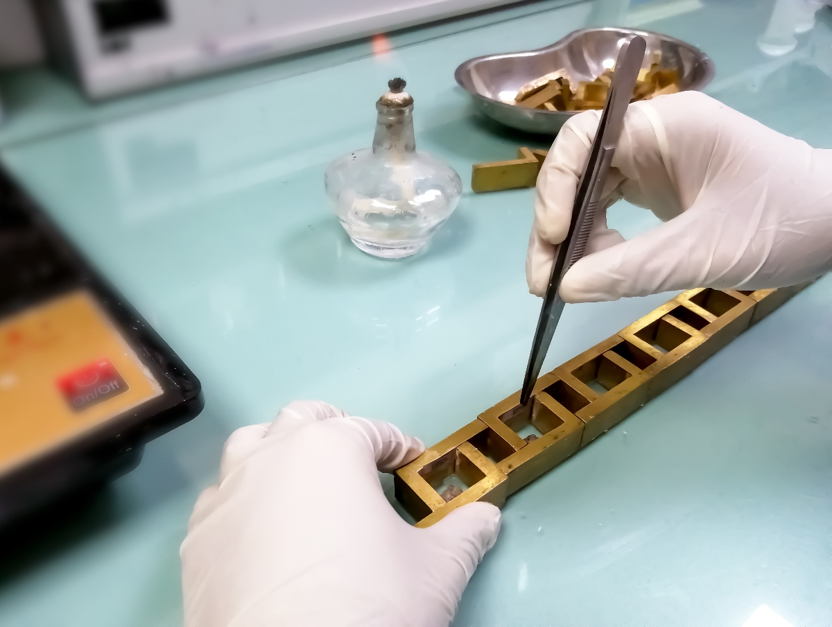 Lab technician embedding human tissue in paraffin wax