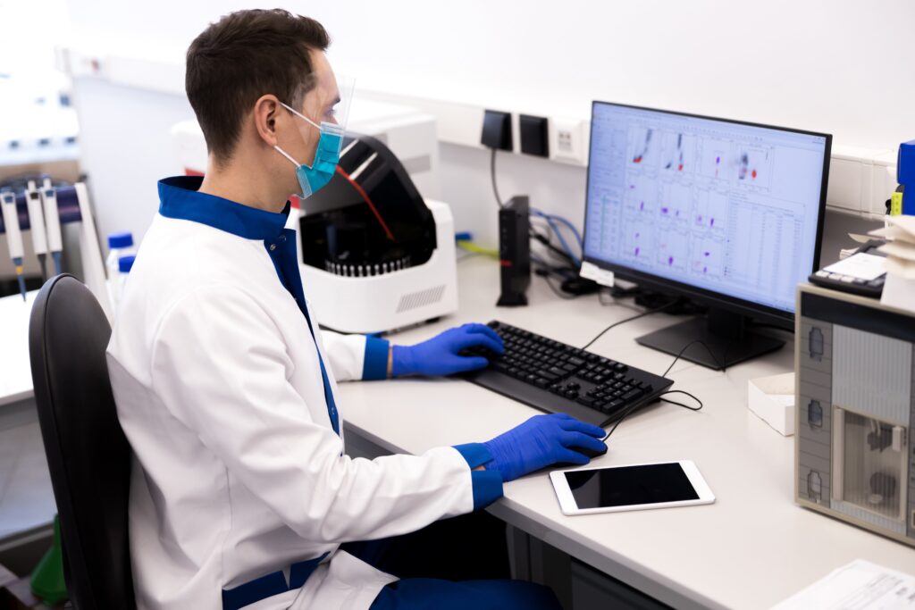 Digital pathology researcher at computer